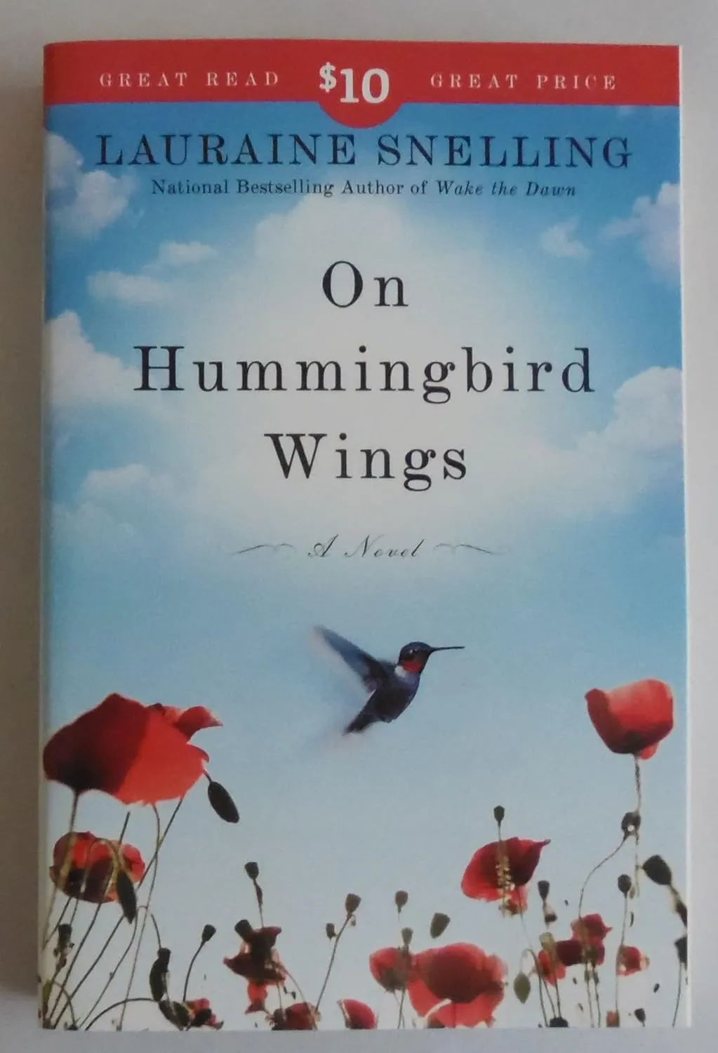 On Hummingbird Wings: A Novel Paperback  April 11, 2011